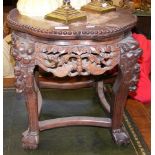 An old Chinese marble top plant stand with carved