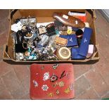 A box containing costume jewellery, including broo