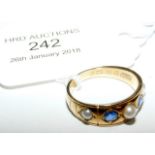 An Edwardian sapphire and pearl ring in 18ct gold