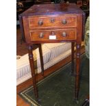 A 19th century mahogany lady's work table on turne