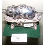 A small metal pig in bath ornament - 10cm