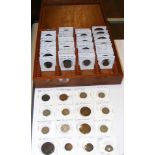A coin case containing a collection of world coins