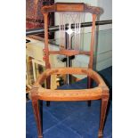 A set of four inlaid 19th century chairs (requirin