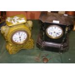 A single train mantel clock in green glazed case,