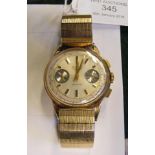 A gent's Avia 9ct gold wrist watch with date calen
