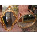 Decorative wall mirror in gilt surround and one ot