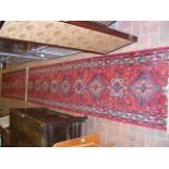 A long Middle Eastern style runner with geometric