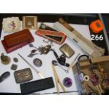 Various collectables, including fan, costume jewel