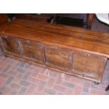 A large hardwood panelled coffer - 176cm long