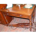 A 19th century fold-over mahogany tea table with s