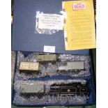 A Hornby 00 Three Rail Tank Engine and four goods