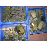 Three plastic trays containing die-cast Army vehic