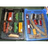 A collection of 00 gauge and 0 gauge goods wagons