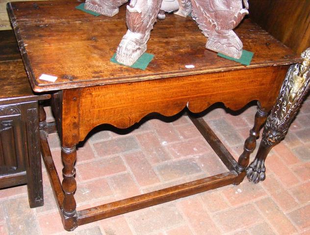 Antique oak occasional table on turned supports