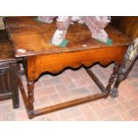 Antique oak occasional table on turned supports