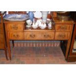 The matching dressing table with five drawers to t