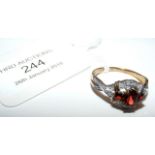 A 9ct gold garnet and pearl ring