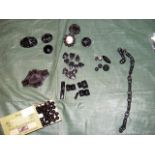 A large collection of various jet jewellery, inclu