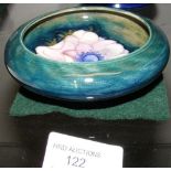 A Moorcroft pottery pin dish with anemone decorati
