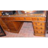 Victorian oak pedestal desk with nine drawers to t