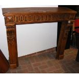 An old rustic pine fire surround
