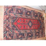 Middle Eastern rug with geometric border - 200cm x