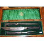 A Humphreys & Co. carving set with silver mounts