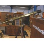 An antique Ross of London brass telescope on tripo