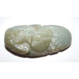 A jade pebble carving of Koi Carp