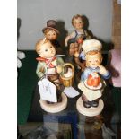 Five Hummel figures