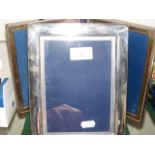 Folding double silver photo frame, together with a