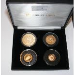 A four piece 22ct gold Queen Elizabeth II coin set