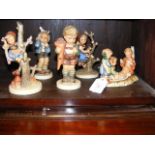 Five Hummel figures