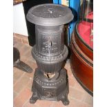 A 73cm high cast metal stove