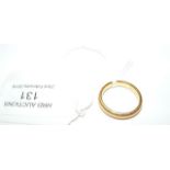 A 22ct gold wedding band - 6g