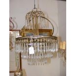 A crystal drop three tiered ceiling light
