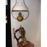 A hanging oil lamp with milk glass shade, converte