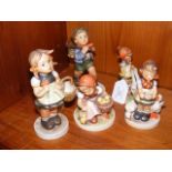 Six Hummel figures