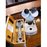 A James Swift & Son electric microscope, together