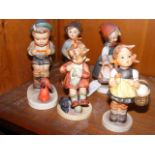 Five Hummel figures