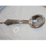 An Indian silver ladle - 32cm long