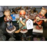 Three Hummel figures