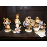 Six Hummel figures