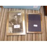 Silver photo frame and one other