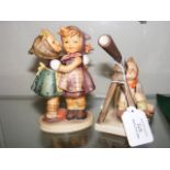 A Hummel figure of boy looking through telescope,