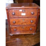 A miniature three drawer chest - 37cm high