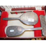 Four piece silver back dressing table set in prese