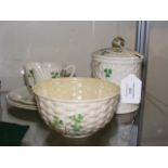 A Belleek preserve jar and cover, etc.