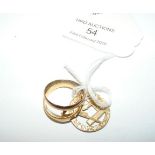 A 22ct gold wedding band - 3g, together with two o