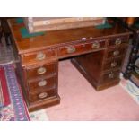 A 19th century mahogany writing desk with drawers
